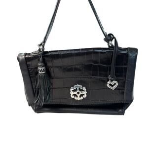 Brighton black leather handbag. 2 pockets with charm, tassel, woven handle